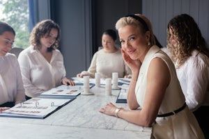 Isabella Loneragan in conversation with practitioners during training